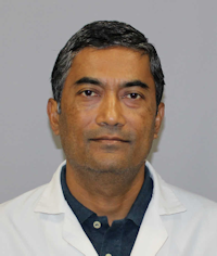 Dr. Tej Shrestha